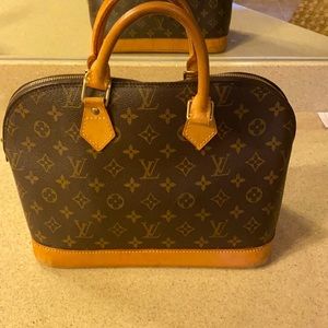 Alma Louis Vuitton handbag in great condition.